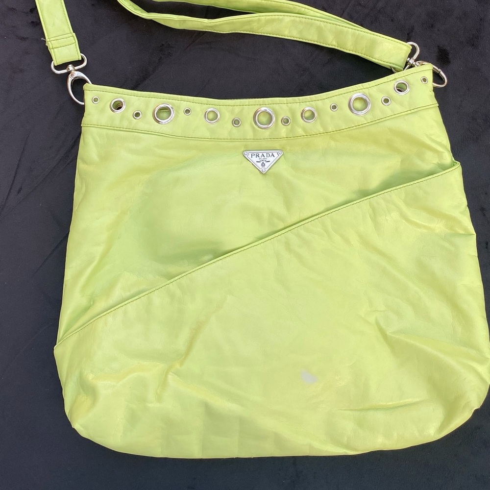 Prada , lime green zipper closure. soft texture. comes extra strap.